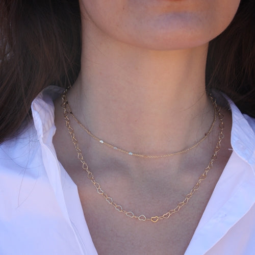 Collier doré maille détails coeurs