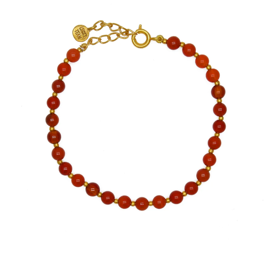 Bracelet doré et perles